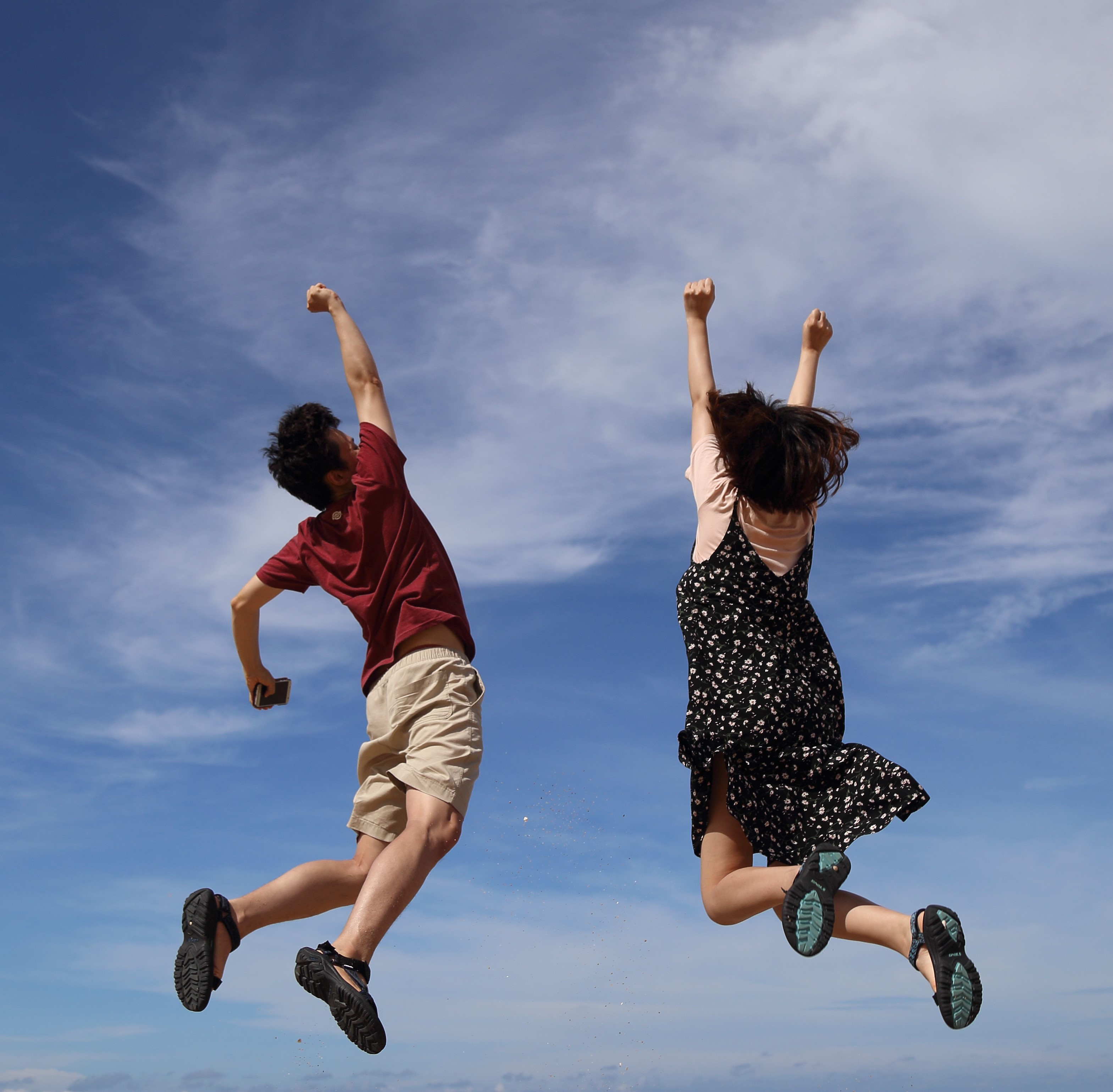 Happy people jumping